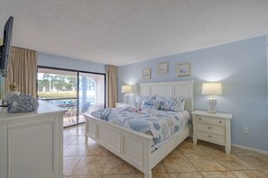 Master Bedroom offers a king bed, private bath, access to balcony & TV.