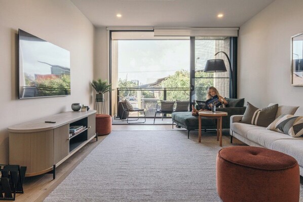 Living room w/ balcony