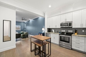 Dining Area + Full Kitchen with Stainless Steel Appliances