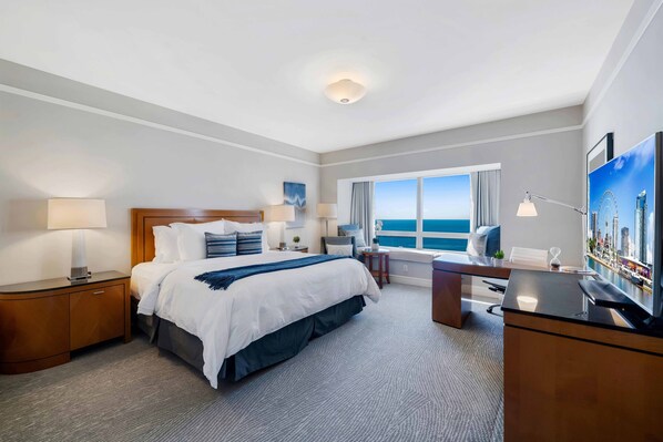 Cozy and Functional: Unwind in this Miami studio's bed, complemented by a single sofa for added comfort. A perfect blend of coziness and functionality for a delightful stay