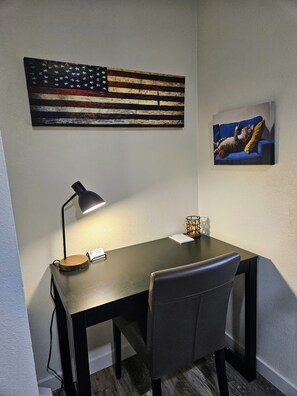 Workspace with surge protected outlets and reliable fiber optic WiFi