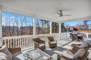 Upstairs deck with commanding views of the lake and gas grill.