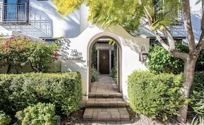 Beautifully landscaped entry way to the spacious condo.  