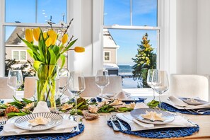 Enjoy family, friends, and memories around the dining table at Driftwood Beach Estate!  We can't wait to host you!