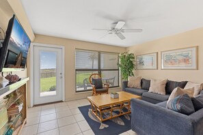 Living Area with direct balcony access facing the beach!