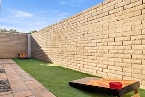 Challenge your friends to a game of cornhole