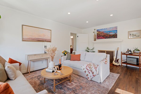 Ample sitting space in living room with TV