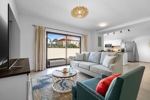 The living room features a vibrant interior that radiates a positive atmosphere.