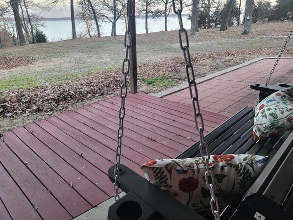 Porch swing overlooking lake