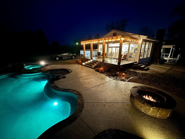 Outdoor pool, hot tub, fire pit, and deck