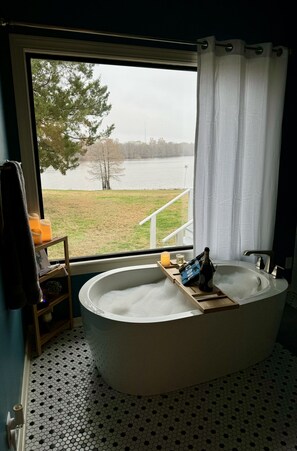 Soaking tub in master bathroom