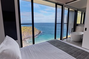 Room with a view.  All bedrooms are identical and feature a king bed.