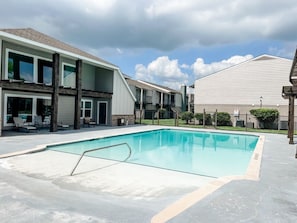 Take a dip in the zero entry, luxurious community pool.