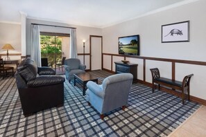 Living area. Exact unit will be assigned upon arrival. Views, colors, and decor may vary.