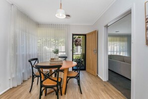 Light-filled open plan dining room.