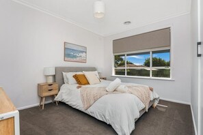 Bedroom two - queen size bed and desk for remote working