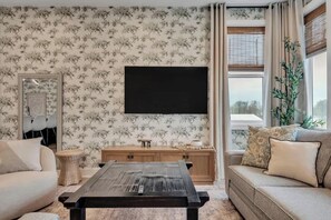 The open concept living room and kitchen with dining table ensure that everyone can participate in the fun! 
The home offers plenty of space to spread out and settle in.