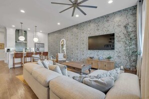 The open concept living room and kitchen with dining table ensure that everyone can participate in the fun! 
The home offers plenty of space to spread out and settle in.