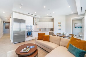 Interiors with kitchen and dining area. 