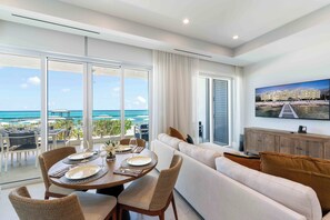 Formal dining area with ocean views. 