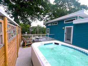 Relax in the hot tub on the 2nd fl. balcony