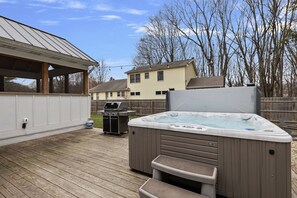 Reclining in a hot tub - any time at all, but especially at night - Priceless.