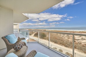 Outdoor dining is an ocean breeze here on the balcony.