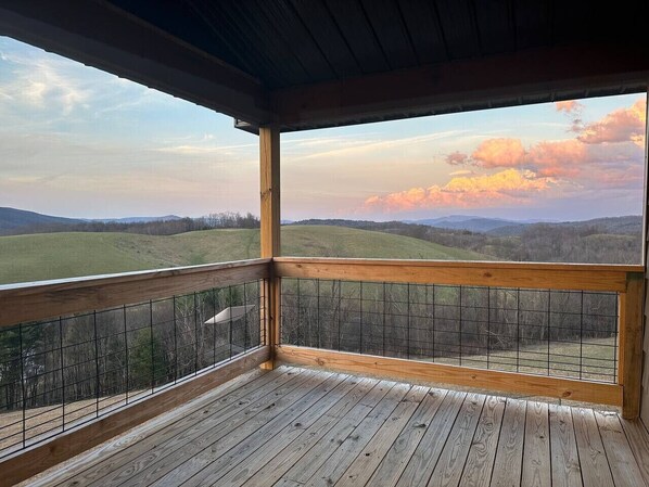 This view is yours to enjoy on your private porch every moment of your stay!