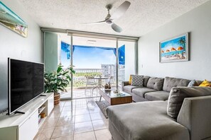 Expansive living room with new sliding doors that open fully for OPEN layout!