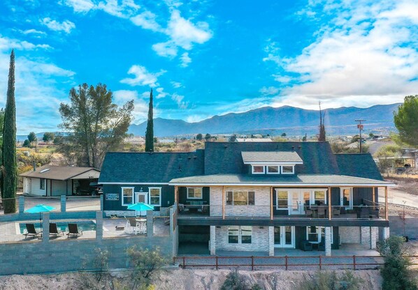 Exterior view of home & pool