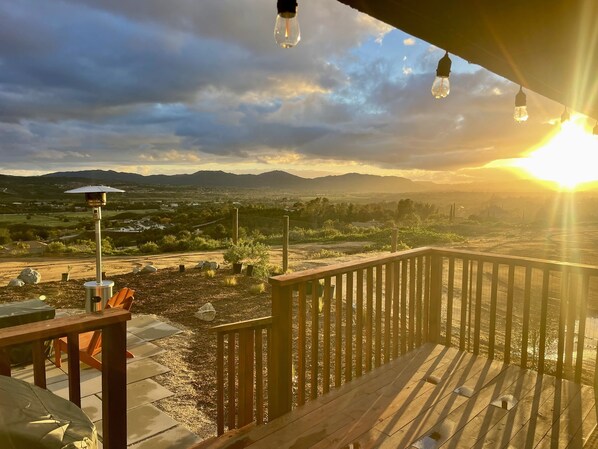 View looking west during sunset on your own private covered patio. 