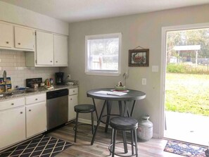 Small dining table for 2 by the window