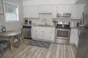 Fully equipped kitchen with everything you need for cooking, and dining table for 2!