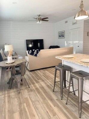 Spacious open-concept design seamlessly connecting the kitchen and living room!