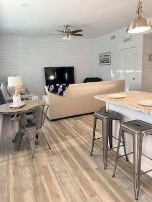 Spacious open-concept design seamlessly connecting the kitchen and living room!