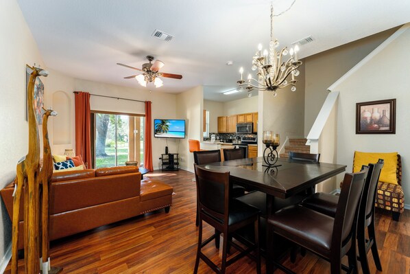 Open floor plan showing kitchen, dining and living rooms