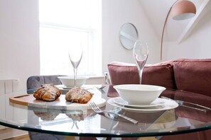 Dining table and sofa.