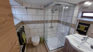 Economy-Apartment Souterrain (22qm) mit Küche, Smart-TV und Regendusche