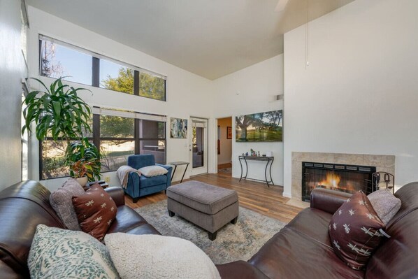 Large, comfortable living room with abundant natural light