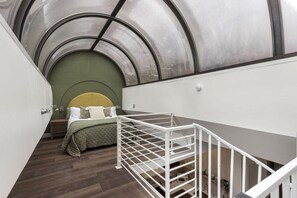 Bedroom 5. Ever want to sleep in a bubble? This unique one of a kind room fulfills that questionable desire. Mobility required for spiral stairs on this room only.