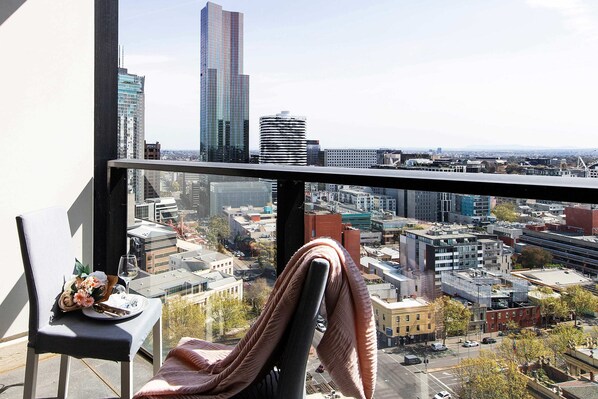 A private balcony to enjoy the view. *(chairs on balcony are from the dining area)