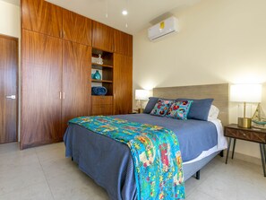 Master ensuite featuring dual sinks, a spacious walk-in shower, and plenty of closet space.


