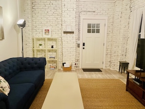 Living room with view of main entrance.