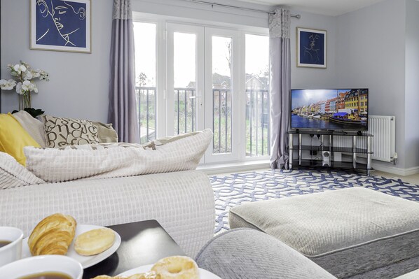 Stylish living area with a blend of comfort and elegance, perfect for gatherings or quiet moments.
