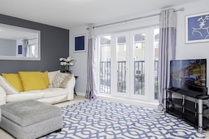Stylish living area with a blend of comfort and elegance, perfect for gatherings or quiet moments.