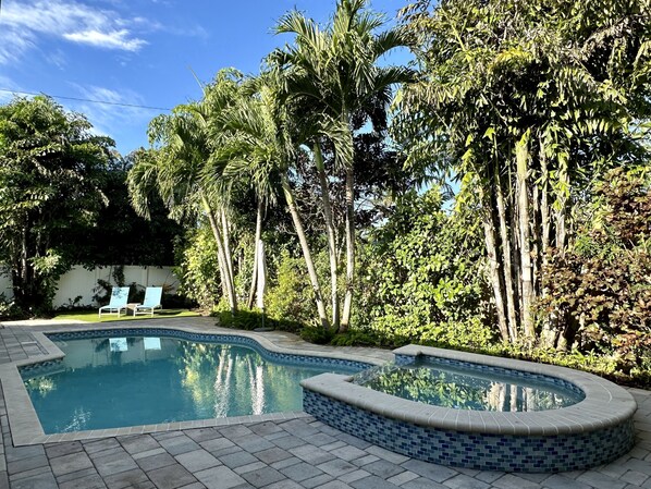 Private backyard with hot tub and pool