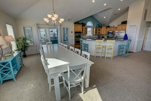 Dining Area with Kitchen in Background