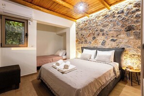 Bedroom with double bed and single bed