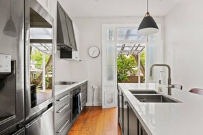 Cook up a feast on high-quality appliances and cooking utensils or discover a flourishing food scene close by.
