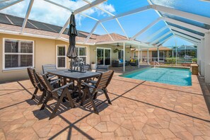 Outdoor dining area, grill included